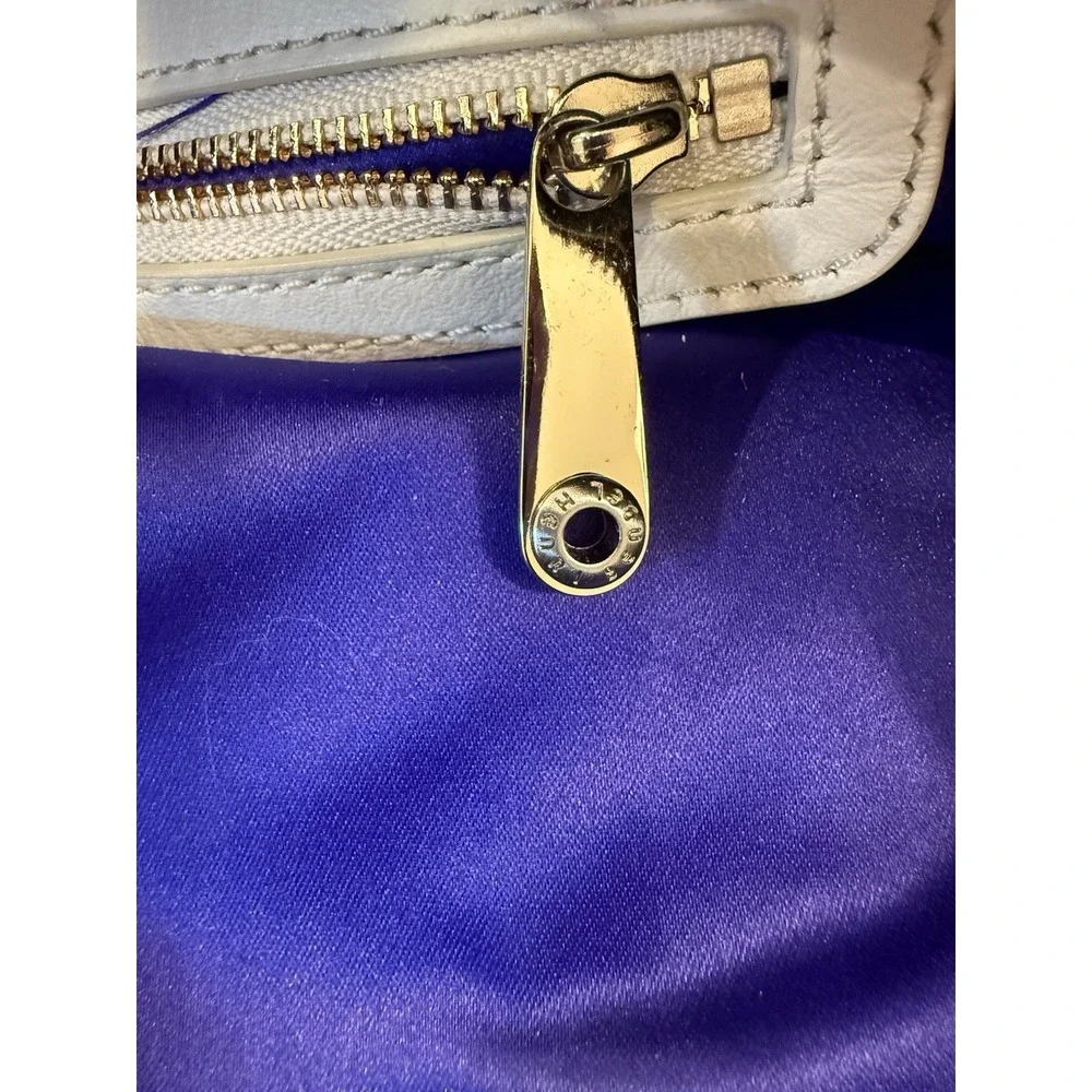 Rare Petrol Henri Bendel Black Jetsetter -  top handle, crossbody, backpack
